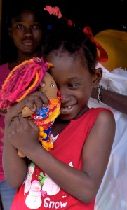 Delivering the dolls to the children in Cap Hatien